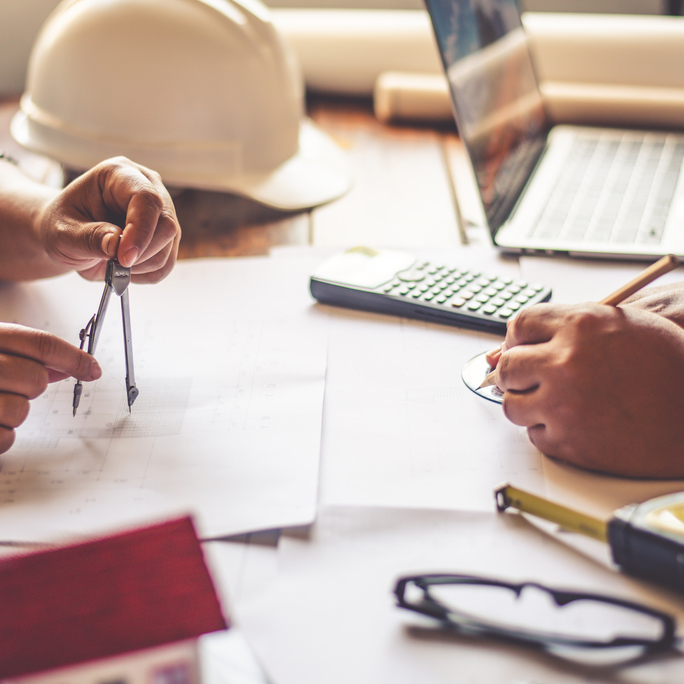 Team of engineers working together in a architect office.
